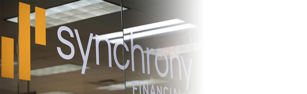 Synchrony logo on glass door