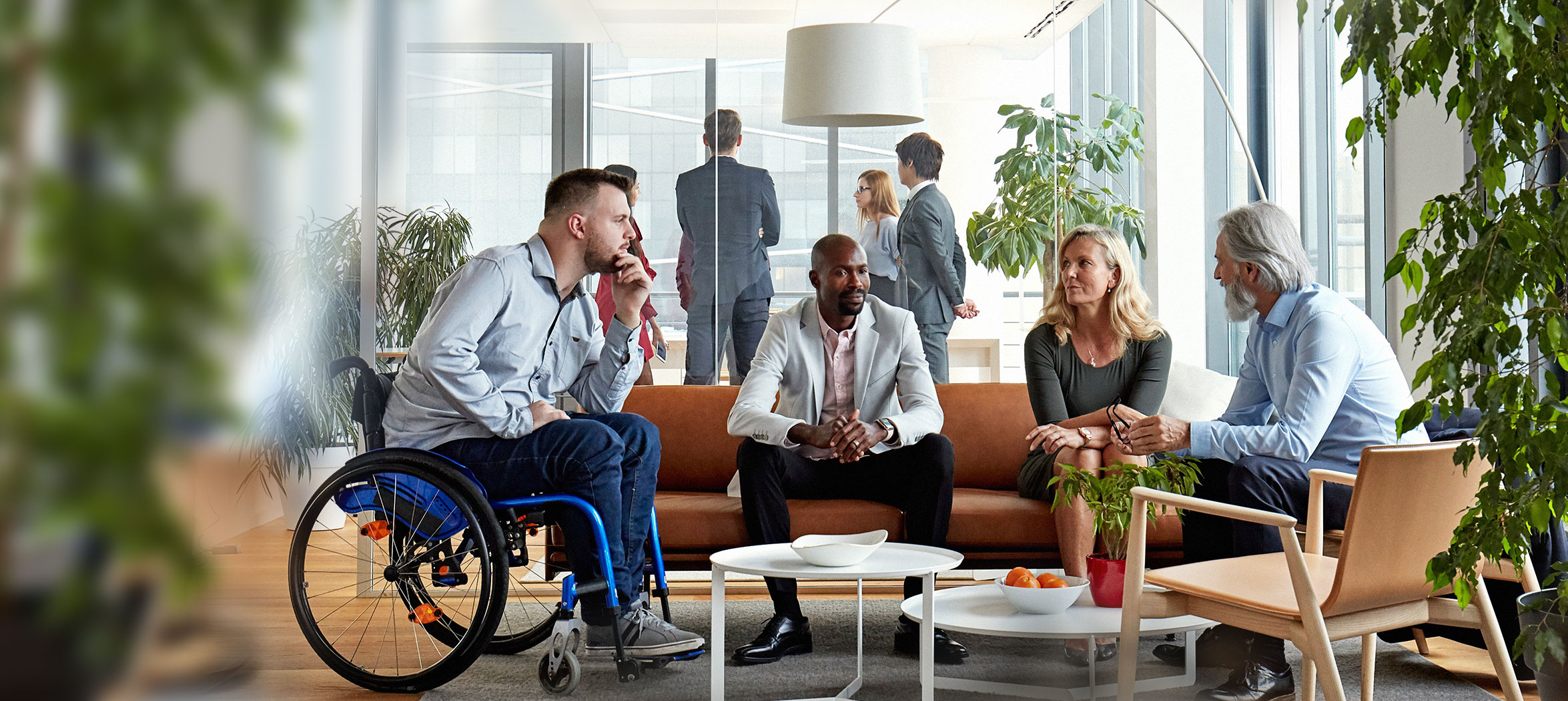 Business people meeting around table in office